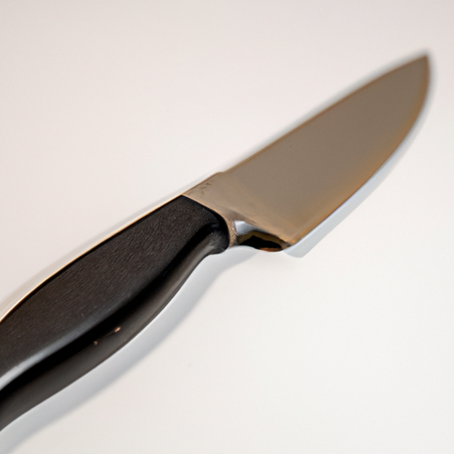 A close-up of a sharp chef's knife, a must-have tool for any home chef.